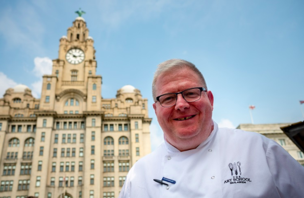 Paul Askew with Liver Building Behind